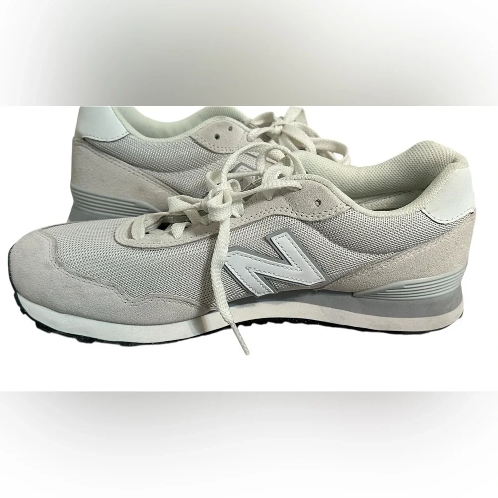 New Balance Grey / White athletic sneakers.